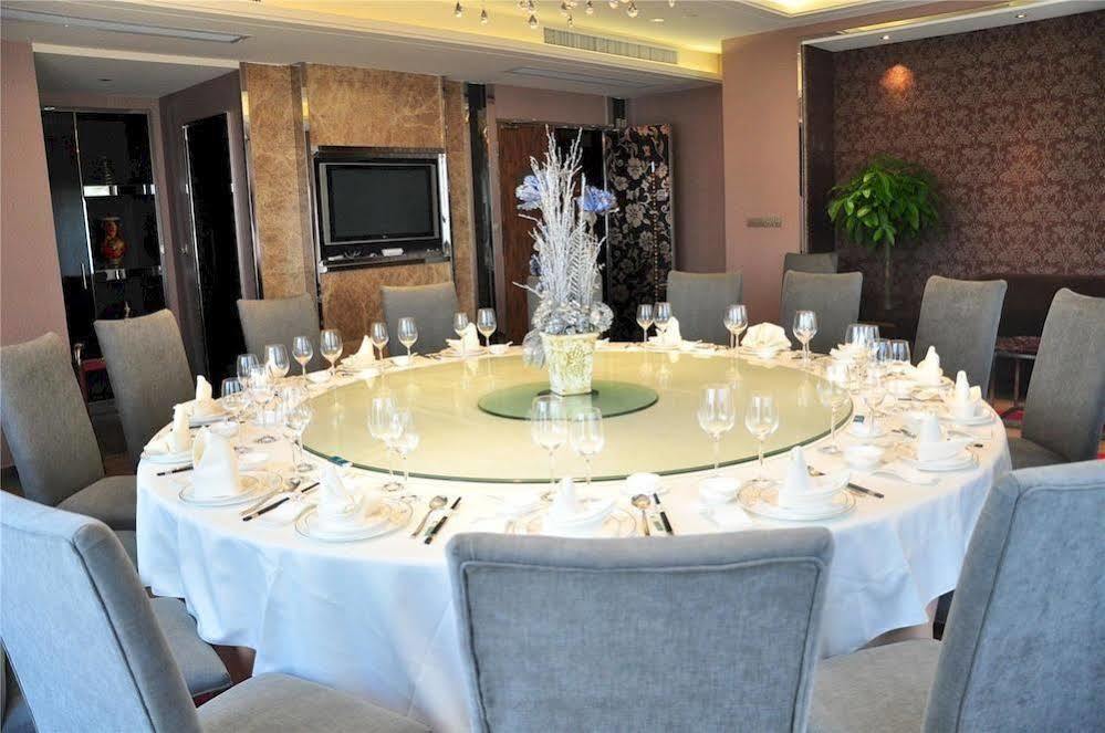 Four Seasons Rayli Hotel Ningbo Extérieur photo