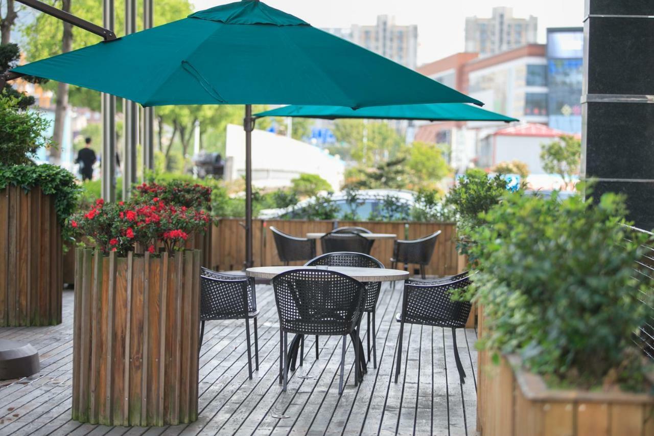 Four Seasons Rayli Hotel Ningbo Extérieur photo